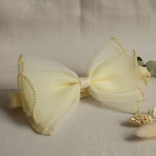 Yellow bow with gold trim headband