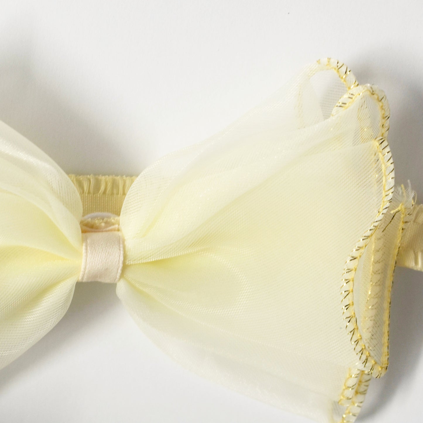 Yellow bow with gold trim headband