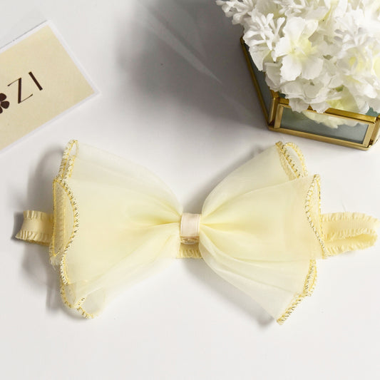 Yellow bow with gold trim headband
