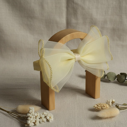 Yellow bow with gold trim headband
